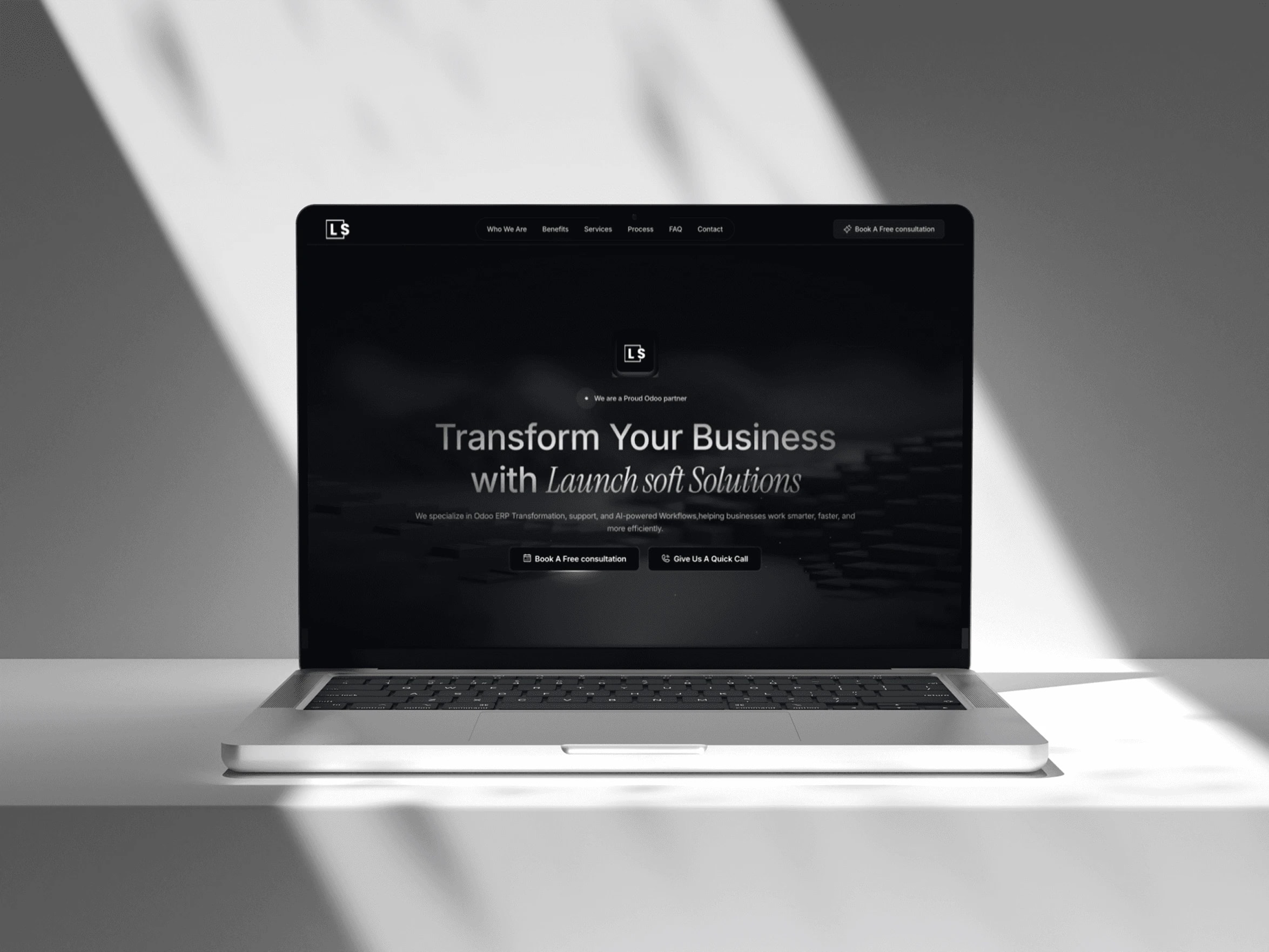 The final Launchsoft design on a laptop